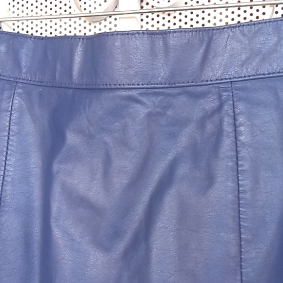 Leather skirt with lining and accent buttons in rear. Size 5/6. - Picture 2 of 10